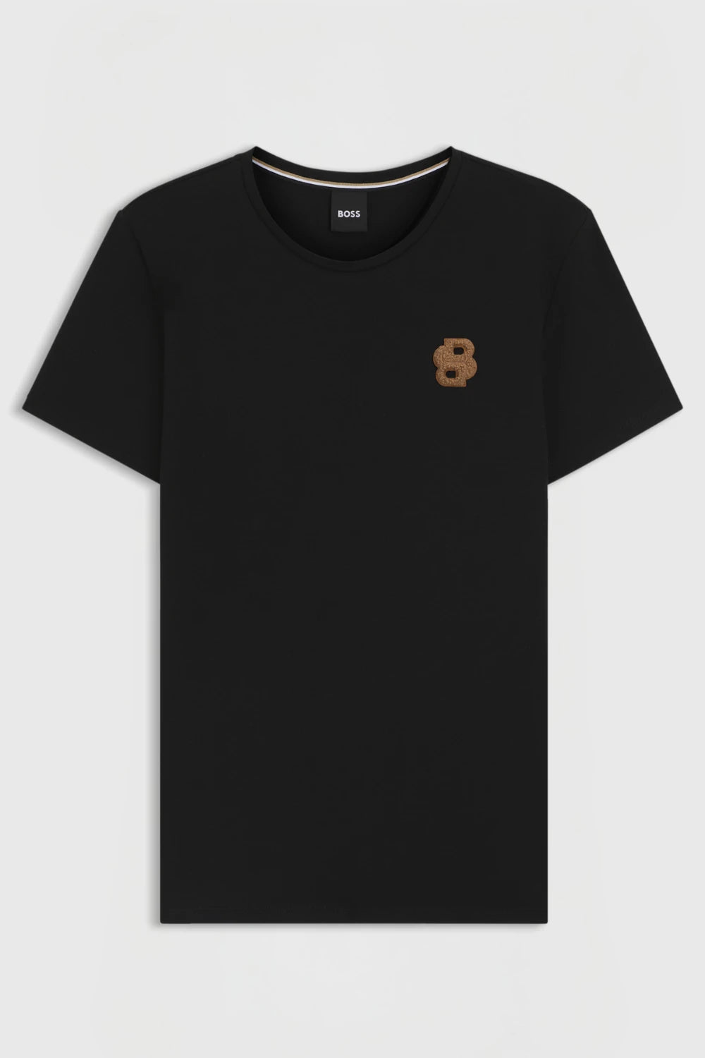 Black | Black t-shirt with a small brown logo on a light gray background